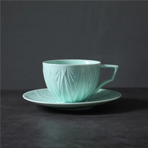 Service à café rétro japonais en céramique avec texture géométrique et finition bleu pâle