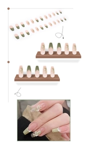 Detail of coffin-shaped press-on nails with 3D camellia flowers and pearl embellishments