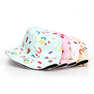 Colorful alphabet graffiti bucket hats for sun protection in blue, pink, white, and beige