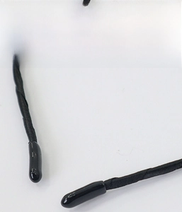 Detail shot of black lace cat ear headband with smooth protective end caps for comfort