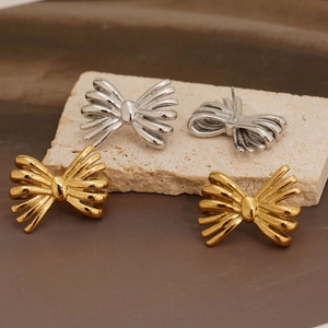 Paire de boucles d'oreilles nœud papillon en acier inoxydable doré et argenté