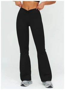 Detail of high waisted flare yoga pants featuring a ruched V-cross waistband design