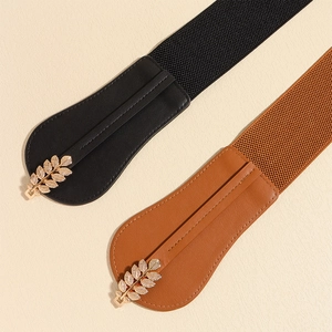 Women vintage elastic leaf buckle waist belts in black and brown faux leather and metal