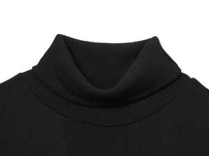 Close-up of black turtleneck knitted dress showing ribbed neckline detail and texture