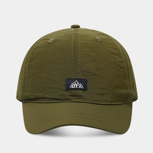 Detail of army green quick-dry baseball cap with mountain logo and breathable nylon fabric
