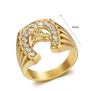 Detailed view of gold horseshoe ring with horse head and 16mm width rhinestone inlay