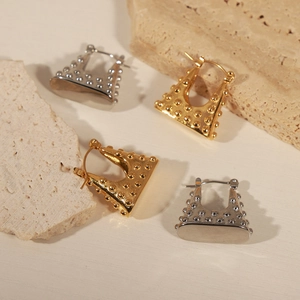Minimalist geometric handbag-shaped earrings in gold and silver finish on stone