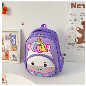 Close-up of a purple cartoon unicorn backpack for kids with rainbow horn and mane