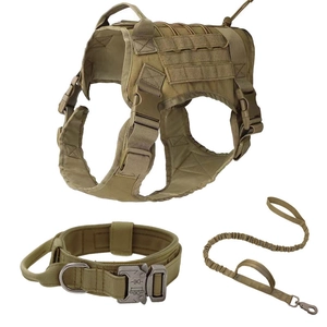 Close-up of coyote brown tactical dog harness set with durable nylon and metal buckles