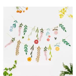 Floral spring banner decoration with colorful paper flowers and leaves for window display