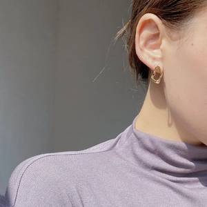 French style gold irregular hollow heart S925 sterling silver stud earrings on model