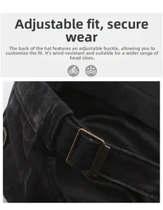 Close-up of adjustable bronze metal buckle on vintage washed denim flat top cap for men