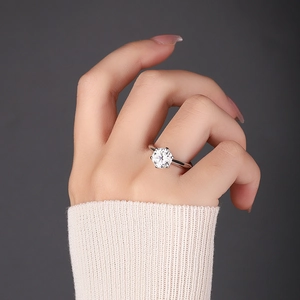 Classic six-prong 1 carat moissanite ring in sterling silver with brilliant round cut diamond