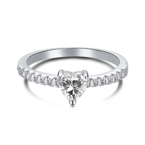 Macro shot of S925 sterling silver ring featuring heart-cut stone and S925 engraving