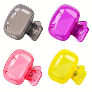 Detailed view of four colorful jelly hair clips in a grid layout on a white background