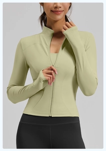 Slim fit sage green yoga jacket with breathable fabric and thumbhole sleeve details