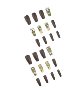 Detail of long coffin press-on nails featuring vintage brown tones and botanical art