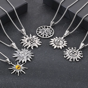 Detailed collection of vintage sun face pendants in silver steel with embossed textures