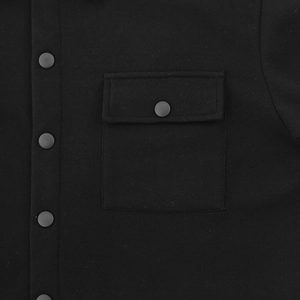Detail of chest flap pocket and round buttons on black fleece jacket for men
