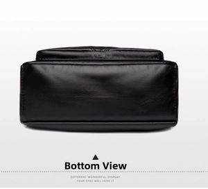 Détails du fond large et des coutures soignées de ce sac à main noir en cuir souple