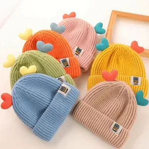 Cute knit baby beanie set with 3D heart accents and ribbed cuffs in multiple vibrant colors