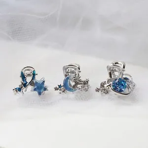 Set di tre mollette per capelli celesti con stella marina blu e luna in lega d'argento