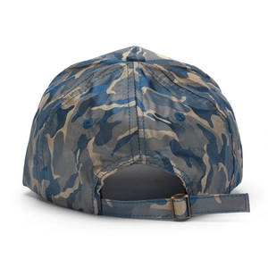 Detail view of camouflage baseball cap back with adjustable fabric strap and metal buckle