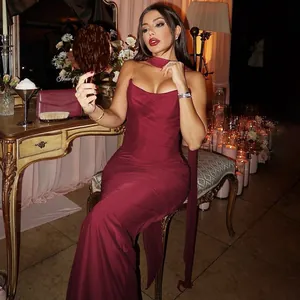 Close-up of the elegant burgundy slim-fit mesh dress with silk-satin texture and ribbons