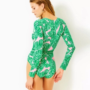 Long sleeve surfing swimsuit with green palm leaf print and sleek high-cut leg design
