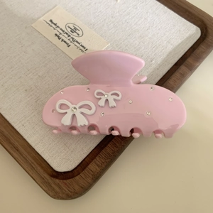 Pink acetate flower hair claw clip with white rhinestone bows for elegant hairstyles