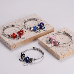 Adjustable evil eye charm bracelets in four colors with Hamsa hand and crystal beads