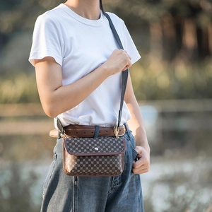 Brown vintage quilted crossbody bag for ladies in outdoor natural light setting