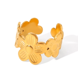 Detailed close-up of golden stainless steel flower petal open ring with polished finish