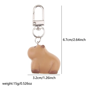 Detailed view of Capybara keychain dimensions 6.7cm by 3.2cm and silver hardware