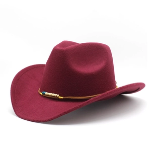 Detailed view of burgundy wool cowboy hat with ethnic beaded band and upturned brim