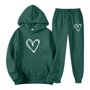 Dark green hooded tracksuit set with white heart line graphics on a white background