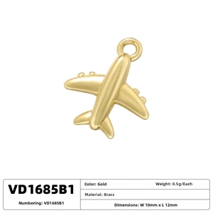 Polished gold airplane pendant charm made of brass, 10mm by 12mm size detail view