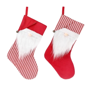 Christmas gnome stockings with white faux fur beards and bells for holiday tree decoration