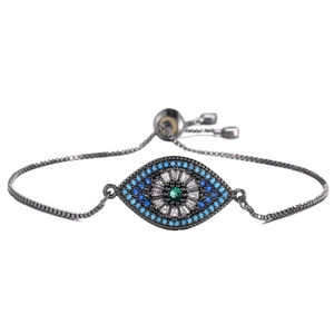 Detailed macro view of black plated evil eye bolo bracelet with colorful zircon stones