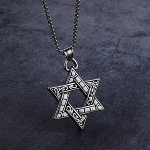 Retro stainless steel Viking Hexagram pendant necklace on a dark stone background