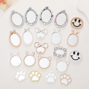 Assorted DIY jewelry mirrors with rhinestone rabbit and cat claw shapes for phone cases