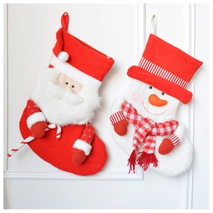 Detail of plush 3D Santa and snowman Christmas stockings with soft knit and fur textures