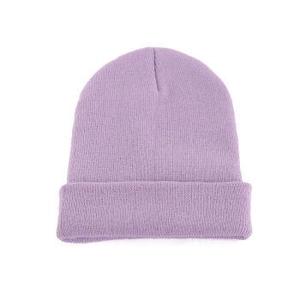 Detail of the light purple knitted beanie showing soft fabric texture and folded cuff style