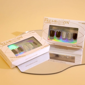 Short brown cat eye and dark coffee press-on nails set in elegant retail packaging