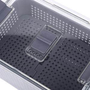 Dual-layer fridge food storage container with grey drainage basket and ventilation valve