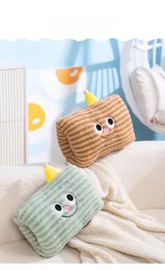 Detailed plush hand warmer pillows with cute cartoon faces and soft striped texture