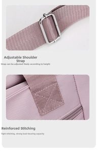 Detail of adjustable nylon shoulder strap and reinforced stitching on mauve oxford bag