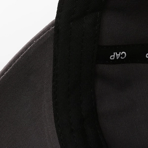 Internal view of twill cotton baseball cap showing reinforced seams and CAP embroidery
