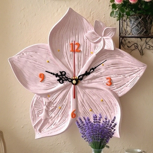 Macro detail of a 3D lotus clock mold showing intricate petal textures and relief designs