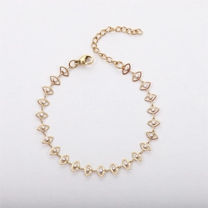 18K gold plated stainless steel eye bracelet with hollow marquise links and white beads